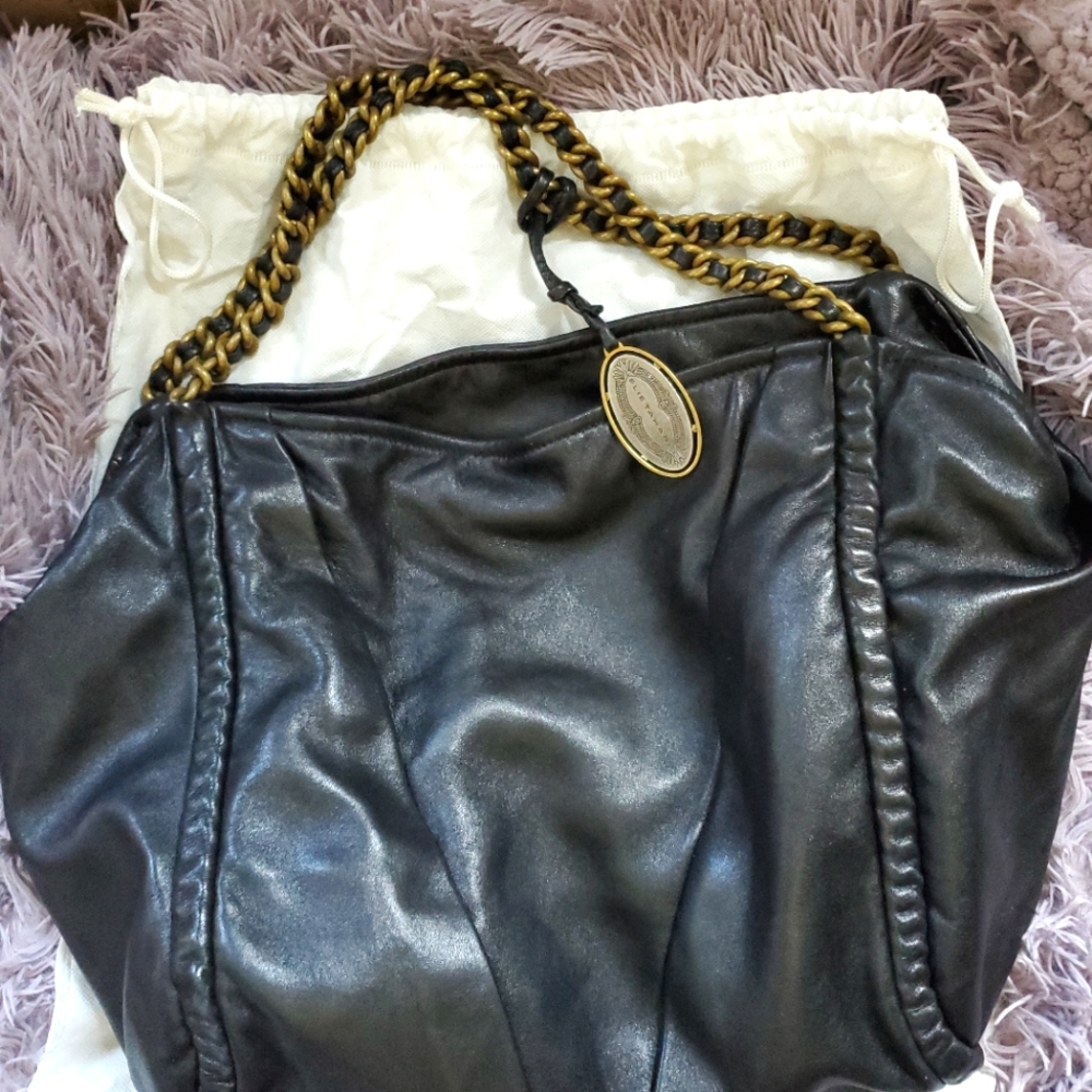 Purse, black and gold, soft.